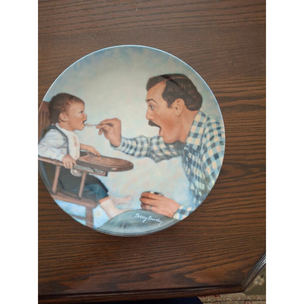 The Edwin M Knowles China Co. Collectible plate title "Open Wide"